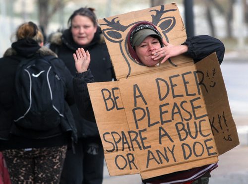 Creative panhandling signage as seen on Main St in Winnipeg- Standup Photo Nov 13, 2014   (JOE BRYKSA / WINNIPEG FREE PRESS)