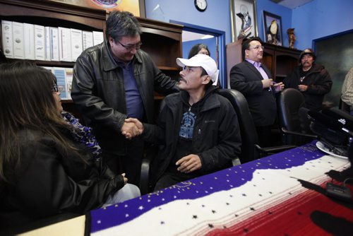 Julie and Caesar Harper, mother and father of Rinelle Harper share a moment with Andrew Colombe, Chief of Marcell Colombe First Nation after press conference Thursday at MKO. Nov 13, 2014 Ruth Bonneville / Winnipeg Free Press