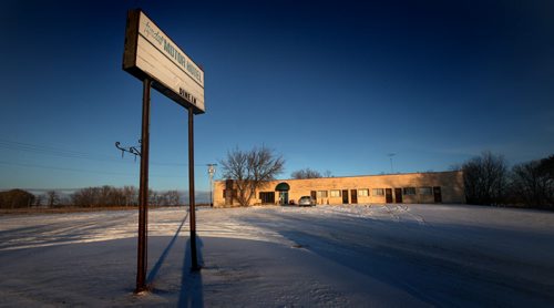 The Tyndal Motor Hotel sits lonely in the dusk Thursday. November 13, 2014 - (Phil Hossack / Winnipeg Free Press)