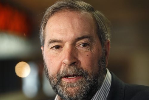 NDP leader Tom Mulcair speaks to media after speaking at a child-care policy conference held in the Fort Garry Hotel Friday. Mary Agnes Welch story. Wayne Glowacki / Winnipeg Free Press Nov. 14 2014