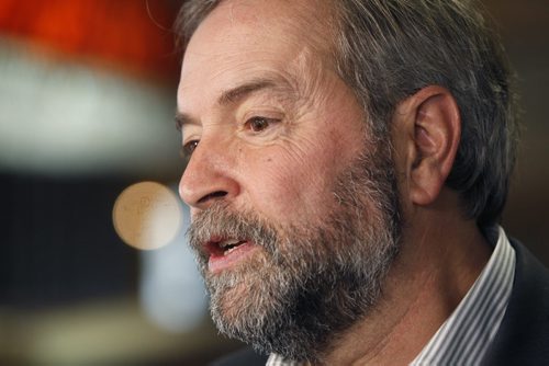 NDP leader Tom Mulcair speaks to media after speaking at a child-care policy conference held in the Fort Garry Hotel Friday. Mary Agnes Welch story. Wayne Glowacki / Winnipeg Free Press Nov. 14 2014