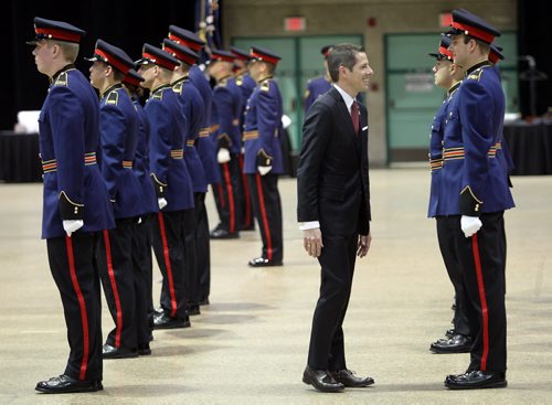 "CLOSE INSPECTION" Mayor Bowman inspects Winnipeg's newest police graduates! Nineteen members of class #156 received their honors and certificates in a ceremony at the Convention Center. See release. November 14, 2014 - (Phil Hossack / Winnipeg Free Press)