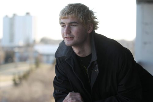Austin Saunders who was recently homeless loves looking out over the city from his large balcony in his  new assisted-living apartment. See Gordon Sinclair story.  Nov 14,  2014 Ruth Bonneville / Winnipeg Free Press