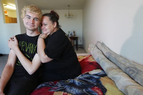 Austin Saunders who was recently homeless now in his new assisted-living apartment where is mom, Tammy visited him Friday for the first time.  (not to use last name of mom).  See Gordon Sinclair story. Nov 14,  2014 Ruth Bonneville / Winnipeg Free Press