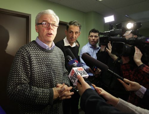 Premier Greg Selinger responds to questions from the media after an emergency meeting with the NDP executive at their office Saturday.   Nov 15,  2014 Ruth Bonneville / Winnipeg Free Press