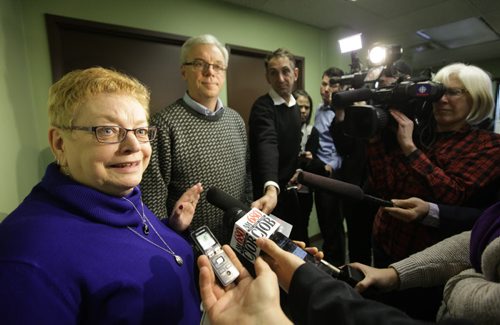 NDP president Ellen Olfert and Premier Greg Selinger respond to questions from the media after an emergency meeting with the NDP executive at their office Saturday.    Nov 15,  2014 Ruth Bonneville / Winnipeg Free Press