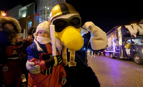 Blue Bombers mascot, Buzz, during Santa Claus Parade, Saturday, November 15, 2014. (TREVOR HAGAN/WINNIPEG FREE PRESS)