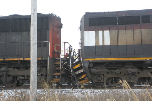 At right, a BC Rail locomotive and a CN locomotive on the rail line along the TransCanada Hwy. east of the CNR Symington Yards after a minor collision Monday morning. Wayne Glowacki/Winnipeg Free Press Nov. 17 2014