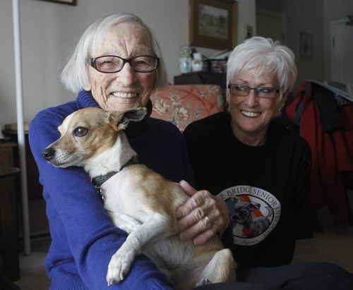 Pet column.  Kathleen Brown,96,  rescued an abused senior dog named Nigel. She got the dog from the Before the Bridge Senior K9 Rescue. At right is Judy Smith, Executive Director of the  Before the Bridge Senior K9 Rescue.  Doug Speirs  story. Wayne Glowacki / Winnipeg Free Press Nov. 17 2014