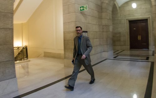 New communications spokesperson, Paul McKie, a former Winnipeg Free Press reporter and a national rep for union Unifor CEP Canada walks the halls of the Manitoba Legislative Building. 141118 - Tuesday, November 18, 2014 -  (MIKE DEAL / WINNIPEG FREE PRESS)