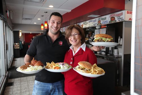 Sunday This City column on Red Top Drive Inn - 219 St. Mary's Rd. with owners Vicky Scouras and her son Peter Scouras  they will be  celebrating its 55th b-day next year. Peter and his mom Vicky Scouras hold some of the iconic dishes at the front entranceway of the restaurant.  Items: Lot-0-Burger Plate, Monster Burger, Beef and Lamb Gyro Plate and Chicken & Spaghetti Dinner.   Nov 18,  2014 Ruth Bonneville / Winnipeg Free Press