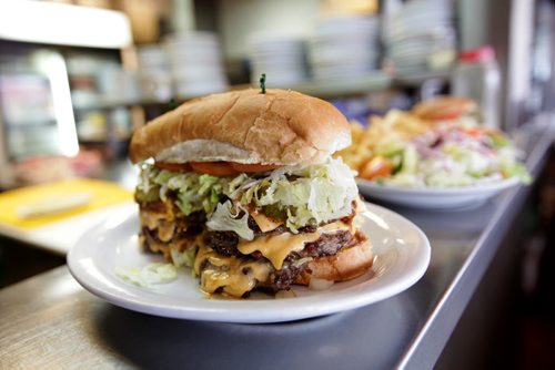 Sunday This City column on Red Top Drive Inn - 219 St. Mary's Rd. with owners Vicky Scouras and her son Peter Scouras  they will be  celebrating its 55th b-day next year. Monster Burger.  Nov 18,  2014 Ruth Bonneville / Winnipeg Free Press