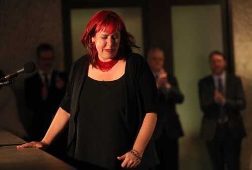 Quebec artist and 2014 Sobey Art Award winner Nadia Myre steps away from the podium after accepting the prestigious award Wednesday evening at the Winnipeg Art Gallery. See Alison Gilmore's story. November 19, 2014 - (Phil Hossack / Winnipeg Free Press)