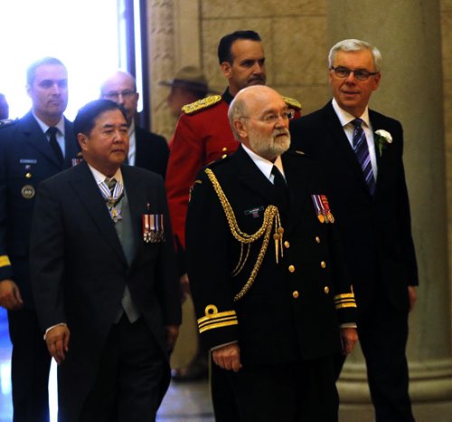 (Right)  Premier Greg Selinger and Left Lt.-Gov. Philip Lee enter the assembly house  to  present the Throne Speech at beginning of the    4th Session of 40th Manitoba legislature Throne Speech for the opening  fall session of the legislature . NOV. 20 2014 /KEN GIGLIOTTI / WINNIPEG FREE PRESS