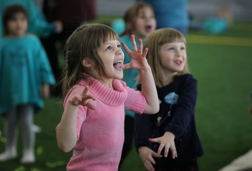 Five-year-old Ellica Winchar Meek dances and makes funny faces to the music performed by children's entertainer Mr. Mark along at U of W's RecPlex Thursday for Kids in Motion event.   Standup photo  Nov 20,  2014 Ruth Bonneville / Winnipeg Free Press