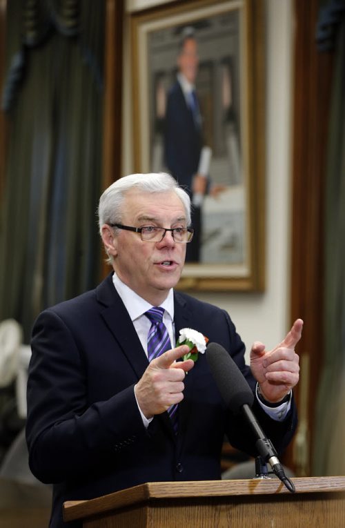 With portrait of Gary Doer in the background Greg Selinger fires back as he talks to media after  4th Session of 40th Manitoba legislature Throne Speech for the opening  fall session of the legislature . NOV. 20 2014 /KEN GIGLIOTTI / WINNIPEG FREE PRESSNOV. 20 2014 /KEN GIGLIOTTI / WINNIPEG FREE PRESS