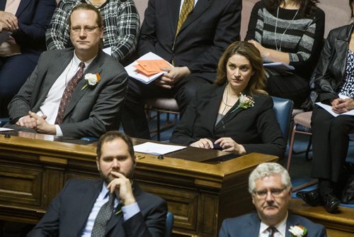 Erin Selby (Southdale) sitting in her new seat as a backbench NDP MLA inside the Manitoba Legislative Assembly Chambers during the speech from the throne Thursday afternoon. 141120 - Thursday, November 20, 2014 -  (MIKE DEAL / WINNIPEG FREE PRESS)