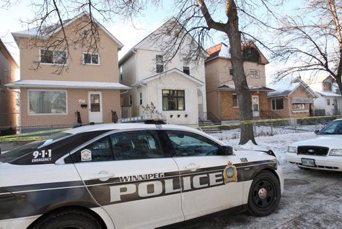 Police at a crime scene at a rooming house at 500 Victor St Friday afternoon- Breaking News Nov 21, 2014   (JOE BRYKSA / WINNIPEG FREE PRESS)