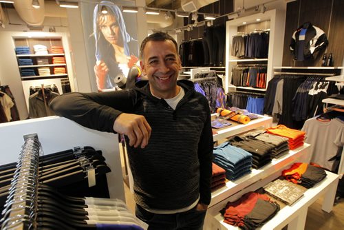 BIZ - Mondetta is getting into the retail business, but only as a way of improving their online sales. They're on the second floor of the Duckworth Centre at the U of W. Marketing guy Tony Lavilla poses for a photo. The store that opened today. BORIS MINKEVICH / WINNIPEG FREE PRESS November 21, 2014