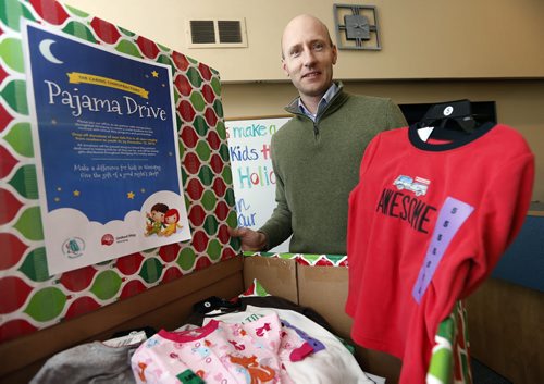UNITED WAY - Dr. Bill Mulhall, who is the president of the MCA. Is one of the organizers of the pyjama drive .related article for the Nov. 22 issue focuses on a pyjama drive that the Manitoba Chiropractors Association (MCA) organizes. They started doing this last Christmas, and this year, they are hoping to collect 1,000 pairs of pyjamas. The United Way will then pick them up and distribute them to families/children who need them.  NOV. 21 2014 / KEN GIGLIOTTI / WINNIPEG FREE PRESS