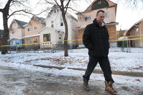 Aurel Labossier witnessed emergency crews pumping the chest of victim at a crime scene at 500 block Victor St ( white house center) early Friday morning- Breaking News- see story Nov 21, 2014   (JOE BRYKSA / WINNIPEG FREE PRESS)- Breaking News Nov 21, 2014   (JOE BRYKSA / WINNIPEG FREE PRESS)