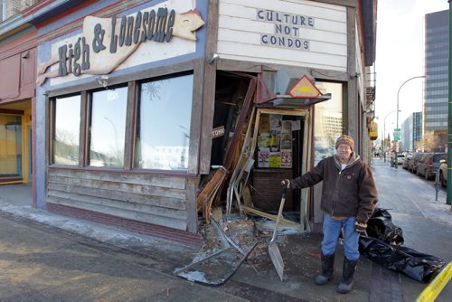 LOCAL - SUV crashes into doors in Winnipeg nightclub Times Change(d). The crash happened at around 9:15 a.m. at the corner of Main Street and St. Mary Avenue. John Scoles is the owner and is scene in front of his business. BORIS MINKEVICH / WINNIPEG FREE PRESS November 24, 2014