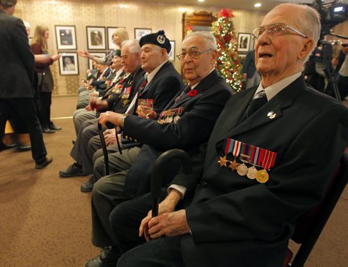 LOCAL/STANDUP - Lt.-Gov. Philip S. Lee hosted a reception at Government House to recognize those Manitoba veterans who are to receive the Knight of the National Order of the Legion of Honour from the Government of France for their part in the liberation of France during the Second World War. Line of vets that got awards.  BORIS MINKEVICH / WINNIPEG FREE PRESS November 25, 2014