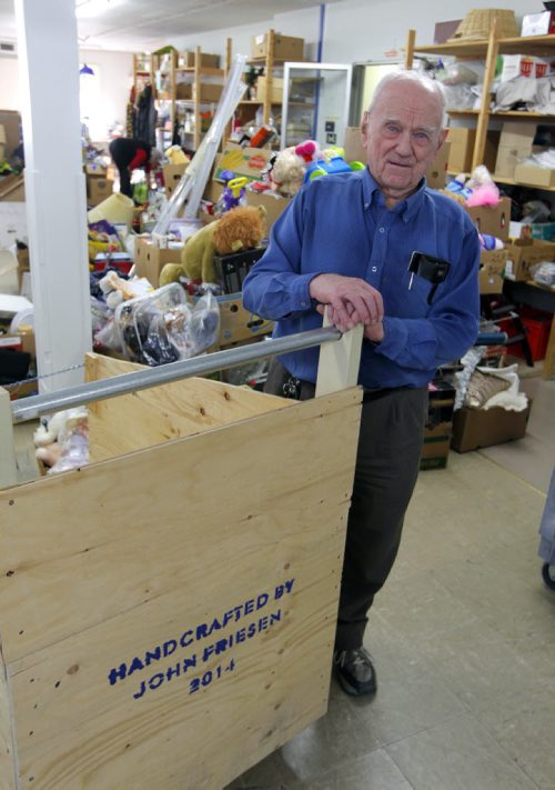 VOLUNTEER - John Friesen, who just turned 93, volunteers at two MCC Thrift Store locations. John is their go-to "Mr. Fix-It" and creative carpenter. Photo taken on the second floor of the Selkirk Street location. BORIS MINKEVICH / WINNIPEG FREE PRESS November 26, 2014