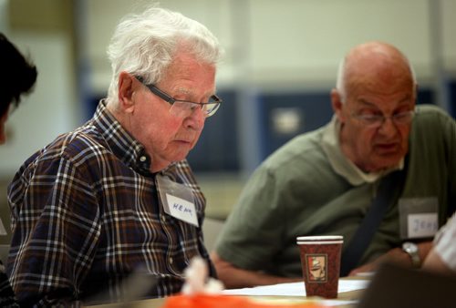 Henk Schippers keeps an eye on the lines as he and a group of Alziemers patients keep their memory sharp in a "Minds in Motion" workshop at the Seven Oaks Wellness Center Wednesday. See Carol Sanders story.  November 26, 2014 - (Phil Hossack / Winnipeg Free Press)