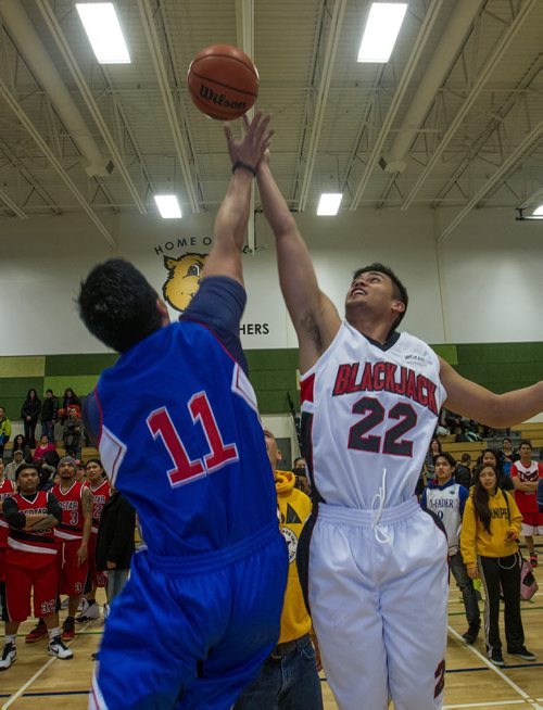 The opening jump shot as almost 1,000 players gathered Sunday to take part in the opening ceremonies for the Philippine Basketball Association Winnipeg Basketball League.  141123 - Tuesday, November 25, 2014 -  (MIKE DEAL / WINNIPEG FREE PRESS)