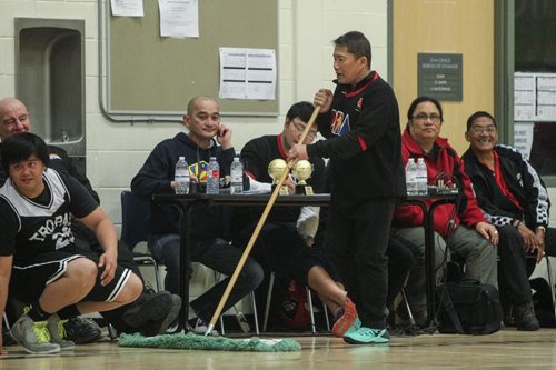 Morris Masangkay keeps the floor clean during a stop in play as almost 1,000 players gathered Sunday to take part in the opening ceremonies for the Philippine Basketball Association Winnipeg Basketball League.  141123 - Tuesday, November 25, 2014 -  (MIKE DEAL / WINNIPEG FREE PRESS)