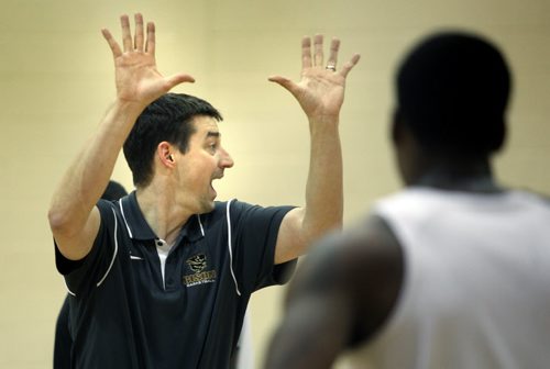 U of M Bison Basketball Coach Kirby Schepp in action during a team workout Thursday afternoon. See Ed Tait's story. November 27, 2014 - (Phil Hossack / Winnipeg Free Press)