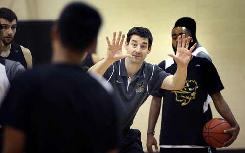 U of M Bison Basketball Coach Kirby Schepp in action during a team workout Thursday afternoon. See Ed Tait's story. November 27, 2014 - (Phil Hossack / Winnipeg Free Press)