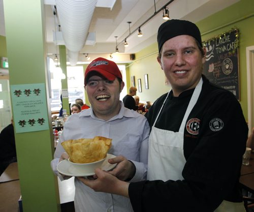 At right is Nolan with co-worker Leonard  in the L'Arche Tova Cafe (119 Regent Ave. West), which is a social enterprise run by the L'Arche community in Winnipeg.  United Way story by Aaron Epp.  Wayne Glowacki / Winnipeg Free Press Nov. 28  2014