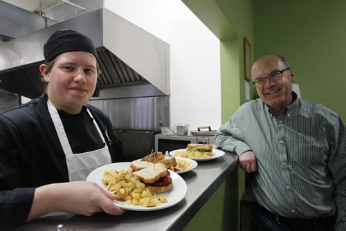 At left is Nolan who works in the kitchen in the L'Arche Tova Cafe (119 Regent Ave. West), which is a social enterprise run by the L'Arche community in Winnipeg. At right is Jim Lapp, executive director L'Arch Winnipeg. United Way story by Aaron Epp.  Wayne Glowacki / Winnipeg Free Press Nov. 28  2014