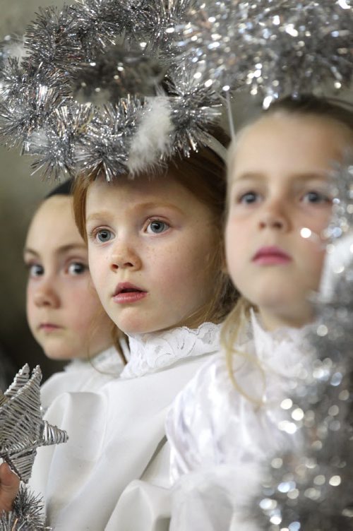 Rose Uhres-Todd (centre), Gracie Bell (left)  and Meaghan Dunn (right)  are little guardian angels over baby Jesus in play, Back to the Manger:  A Living Nativity performed by Headingley United Church Theatre Group at the Van MassenhovenÄôs Farm, 1588 Bobiche St. in Headingley Saturday afternoon. A second performance will be held at 1pm Sunday afternoon. Tickets $15 each (includes hot lunch). Standup  Nov 29,  2014 Ruth Bonneville / Winnipeg Free Press