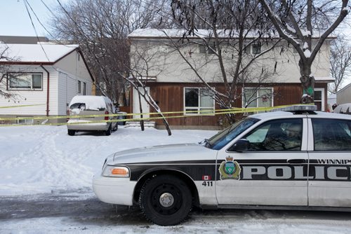 Police secure off a side by side at 145 La Verendrye in St. Boniface Saturday after a early morning stabbing that sent one man to the hospital in critical condition.  Nov 29,  2014 Ruth Bonneville / Winnipeg Free Press