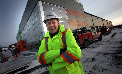 Rene Nicholson, director of property for Birchwood Automotive Group, poses at its new $6-million used car reconditioning centre being built on Portage ave outside the Perimeter Highway in Headingly. See Geoff Kirbyson story. December 1, 2014 - (Phil Hossack / Winnipeg Free Press)