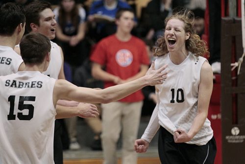 December 1, 2014 - 141201  -  Steinbach Sabres Mackenzie Hildebrand (10) celebrates a point against the Lord Selkirk Royals  in the Manitoba High Schools Athletic Associations Boys AAAA volleyball final at University of Manitoba Monday, December 1, 2014.  John Woods / Winnipeg Free Press