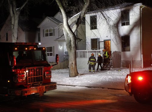 Winnipeg Fire crews arrived at a fire in a two storey house at 499 Pritchard Ave. at 5A.M. Thursday morning. The five adults and 4 children safely evacuated and no one was injured. The cause is under investigation.  Wayne Glowacki / Winnipeg Free Press Dec.4  2014