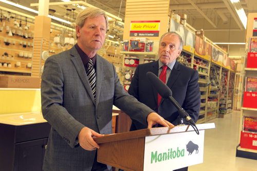 LOCAL - Consumer protection/contractors legislation. Mike Moore, president, Manitoba Home Builders' Association, and Tourism, Culture, Heritage, Sport and Consumer Protection Minister Ron Lemieux make announcement at McMunn and Yates Building Supplies, 600 Pembina Hwy. Improving consumer protection and clarity when dealing with contractors was the topic. NO REPORTER. BORIS MINKEVICH / WINNIPEG FREE PRESS December 4, 2014