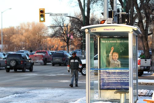 An Ad about Ontario's public school funding is seen at the bus shelter on Academy at Wellington because of the CMHR being located in Winnipeg. See Kevin Rollason's story.  Dec 04,  2014 Ruth Bonneville / Winnipeg Free Press