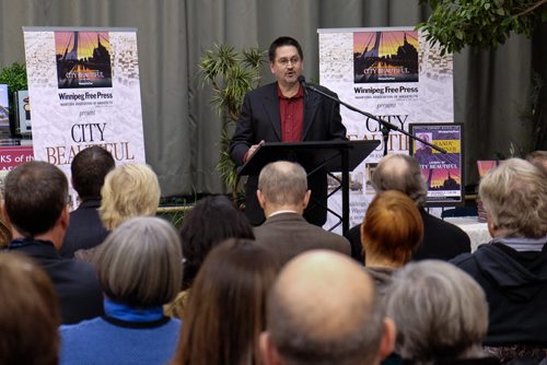 Lee McCormick president of the MAA who partnered with the Free Press, talks during the launch of the Winnipeg Free Press book City Beautiful at McNally Robinson Thursday evening. 141204 - Thursday, December 04, 2014 -  (MIKE DEAL / WINNIPEG FREE PRESS)