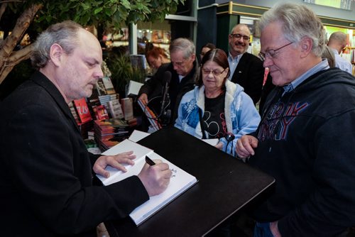 Author Randy Turner signs books during the launch of the Winnipeg Free Press book City Beautiful at McNally Robinson Thursday evening. 141204 - Thursday, December 04, 2014 -  (MIKE DEAL / WINNIPEG FREE PRESS)