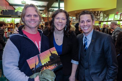 Architect Brent Bellamy (left) Photographer and Multimedia Editor Melissa Tait (centre) and Winnipeg Mayor Brian Bowman (right) at the launch of the Winnipeg Free Press book City Beautiful at McNally Robinson Thursday evening. 141204 - Thursday, December 04, 2014 -  (MIKE DEAL / WINNIPEG FREE PRESS)