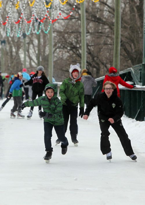 LOCAL - STANDUP - Some students from Seven Oaks Middle School skate the trails at the Forks. Although the river trail is not yet open due to poor river ice conditions, the trails and rinks at The Forks are open to the public. Skate rentals are also open. The school was there on a scheduled field trip. BORIS MINKEVICH / WINNIPEG FREE PRESS December 5, 2014