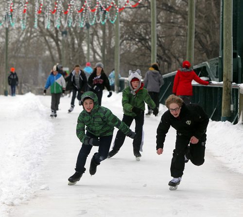 LOCAL - STANDUP - Some students from Seven Oaks Middle School skate the trails at the Forks. Although the river trail is not yet open due to poor river ice conditions, the trails and rinks at The Forks are open to the public. Skate rentals are also open. The school was there on a scheduled field trip. BORIS MINKEVICH / WINNIPEG FREE PRESS December 5, 2014