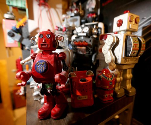 Steve Chmara collects vintage tin toys (wind-up and battery-operated) from the '40s and '50s, Thursday, December 4, 2014. (TREVOR HAGAN/WINNIPEG FREE PRESS)