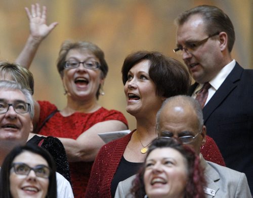 Theresa Oswald performs with the MLA Choir during the open house at the Manitoba Legislative Building, Saturday, December 6, 2014. (TREVOR HAGAN/WINNIPEG FREE PRESS)