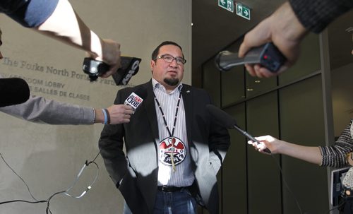 Grand Chief Derek Nepinak speaks to media Monday in the Canadian Human Rights Museum regarding the  Assembly of Manitoba Chiefs Families First approach.  A  call to action on missing and murdered Indigenous women and girls.   Alex Paul story.   Wayne Glowacki / Winnipeg Free Press Dec.8 2014